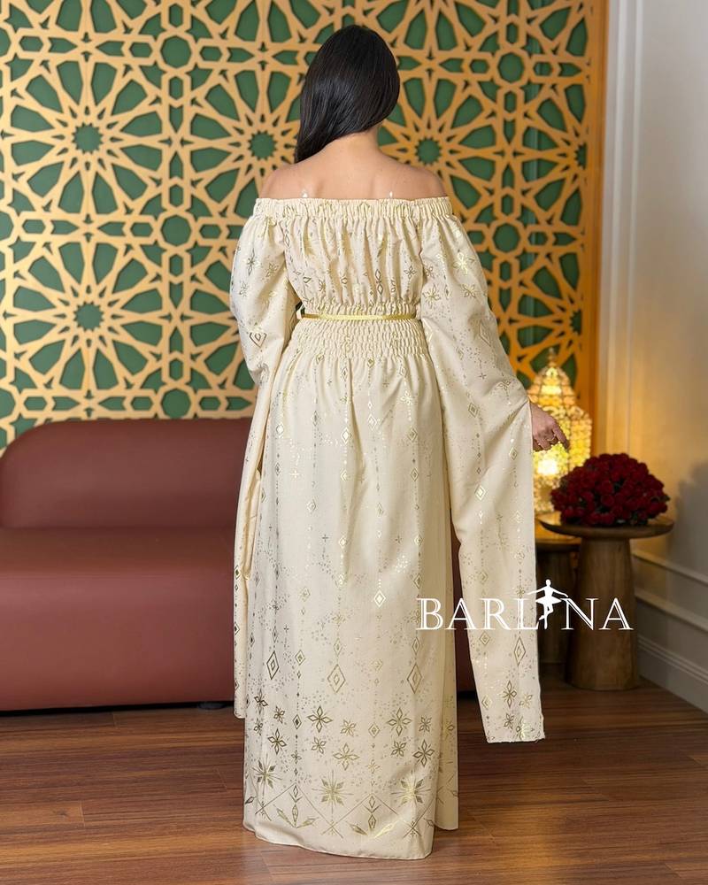 Jalabiya with gold patterns and an off-shoulder collar
