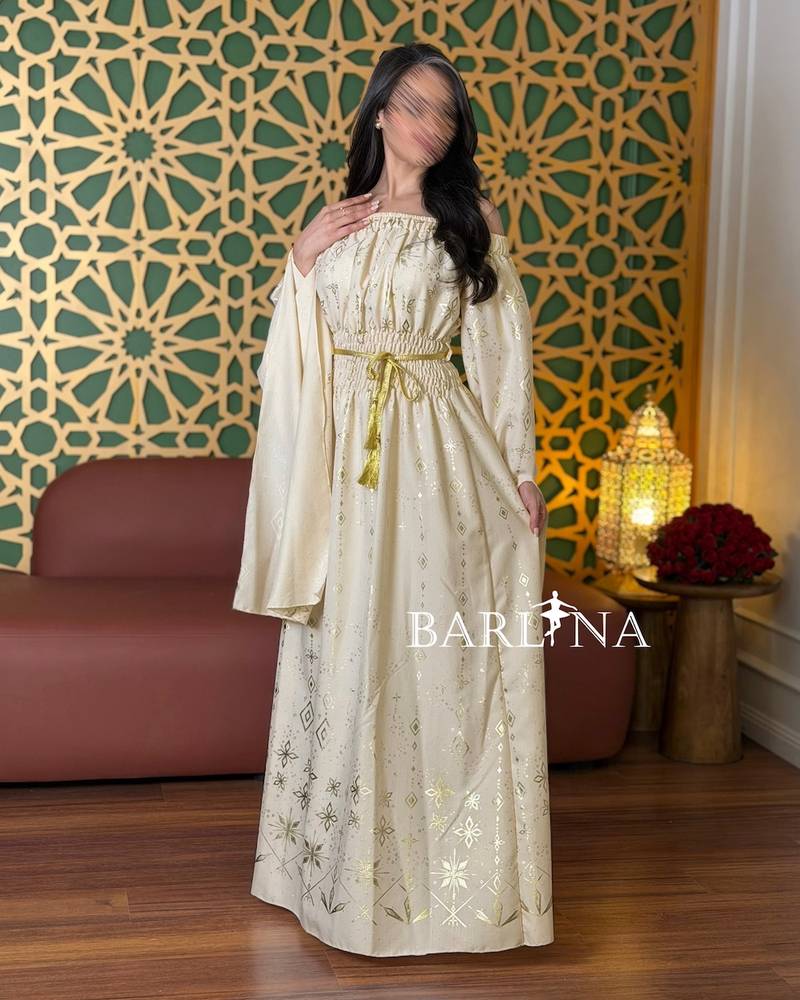 Jalabiya with gold patterns and an off-shoulder collar