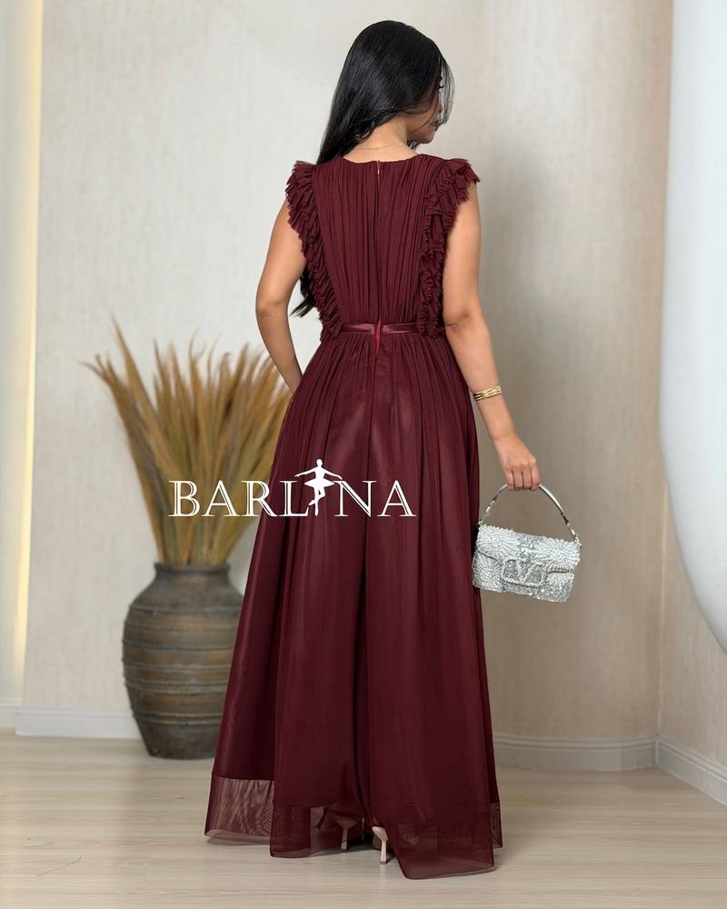 Long burgundy dress with soft pleats