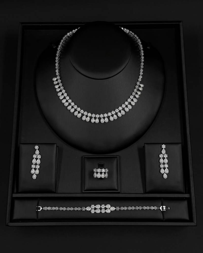 Elegant accessory set with a repeating, draped design