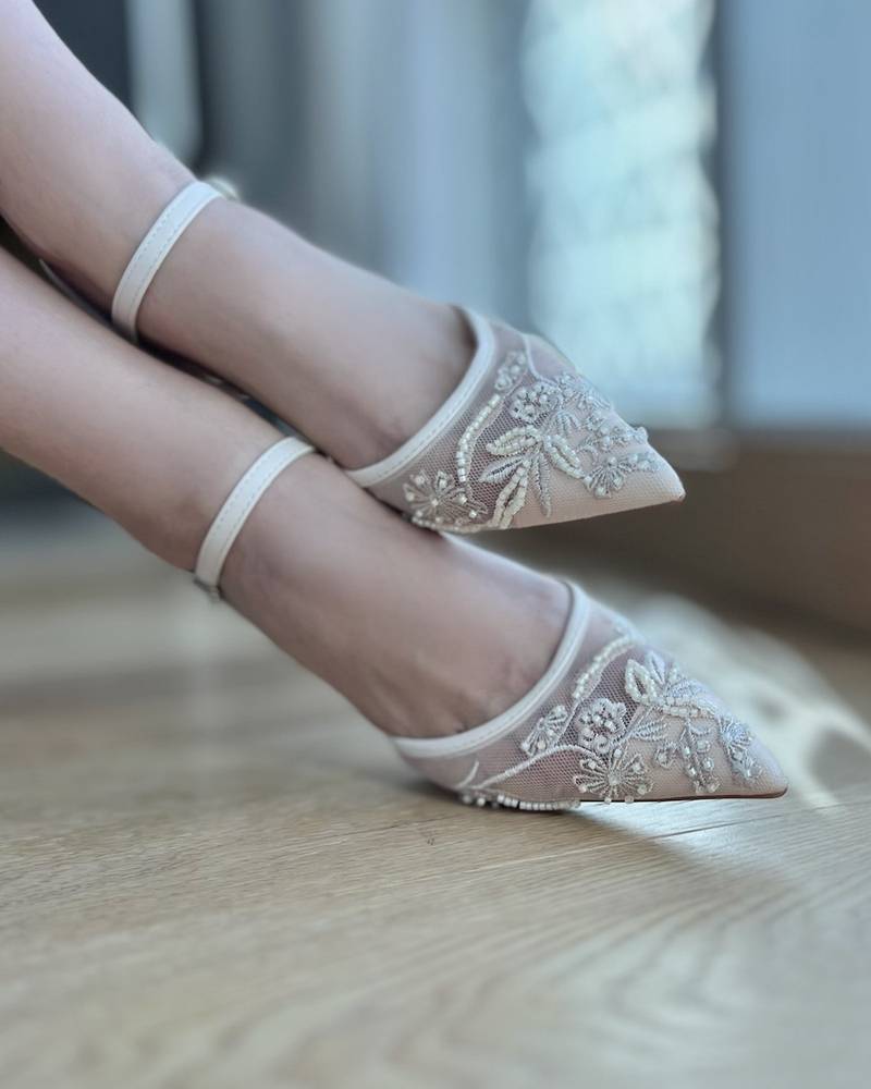 Elegant transparent women's heel with a thin strap