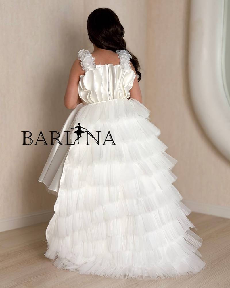 white girls' evening dress with a long train