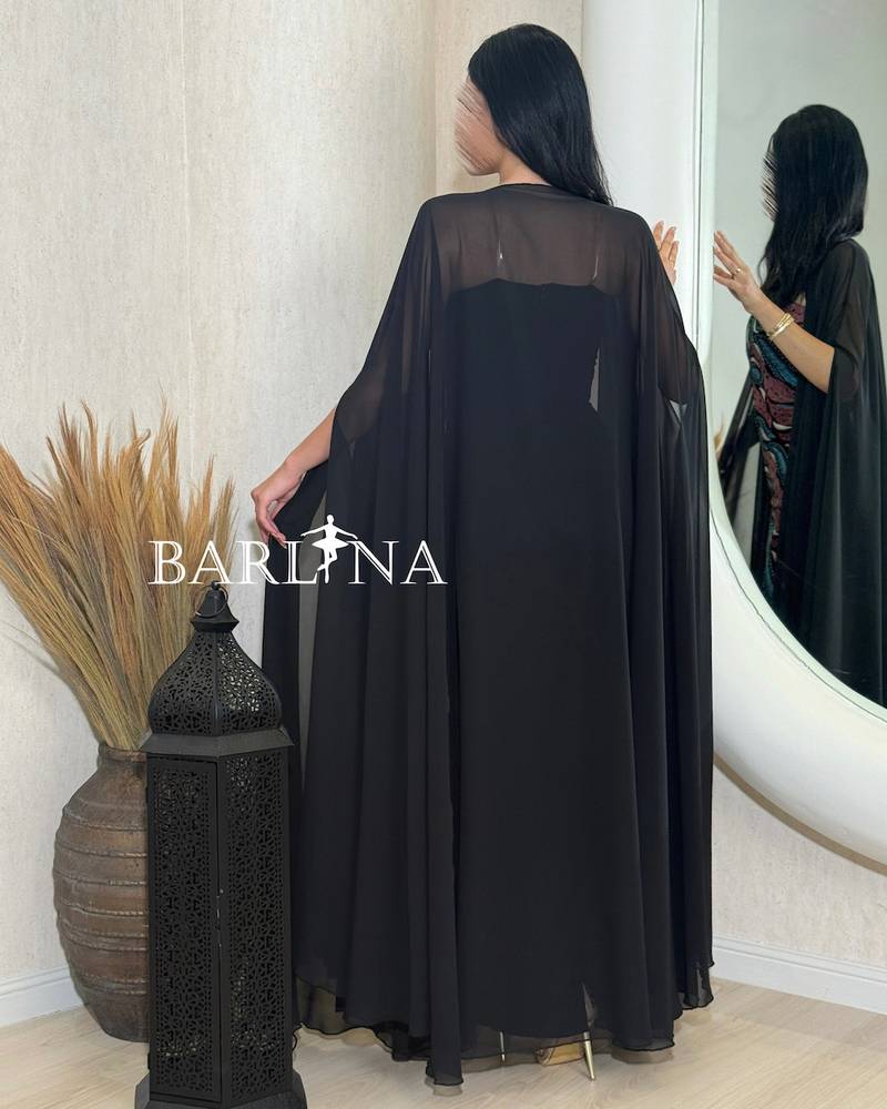 Luxurious black jalabiya with an artistic wavy pattern