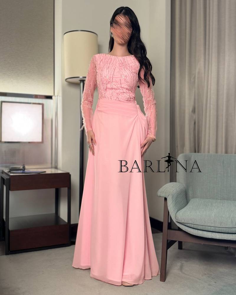 Pink draped dress with sheer embroidered sleeves