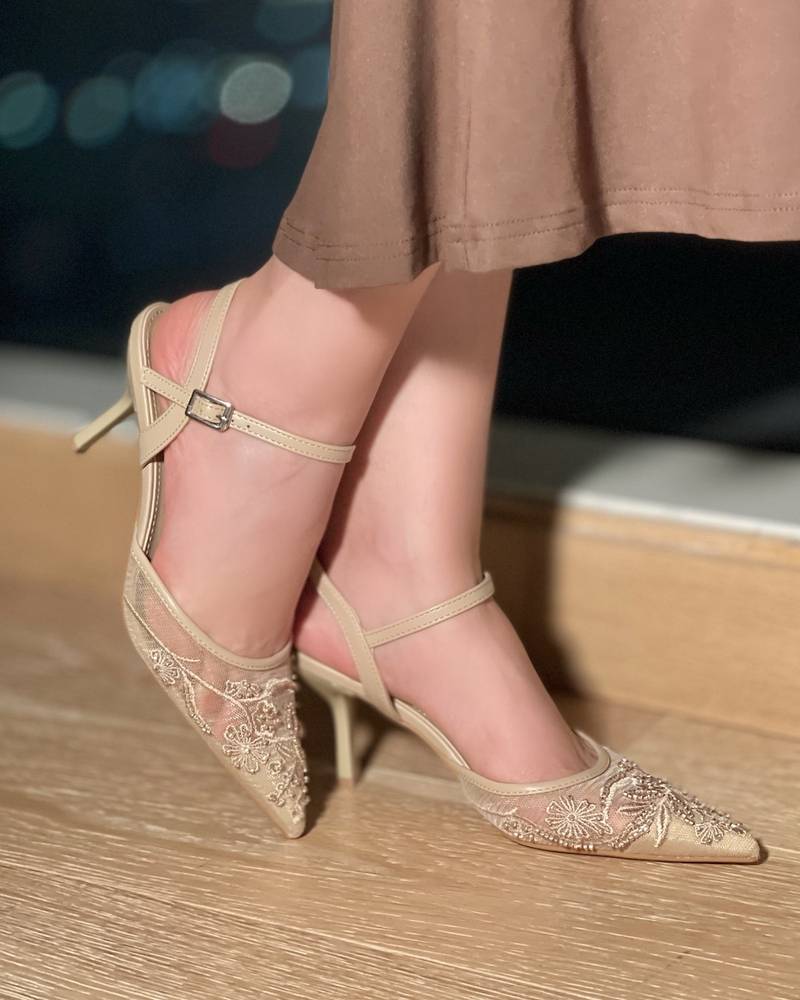 Elegant transparent women's heel with a thin strap