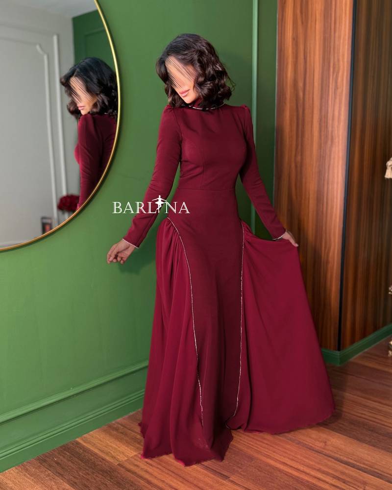 A royal burgundy dress with elegant side details