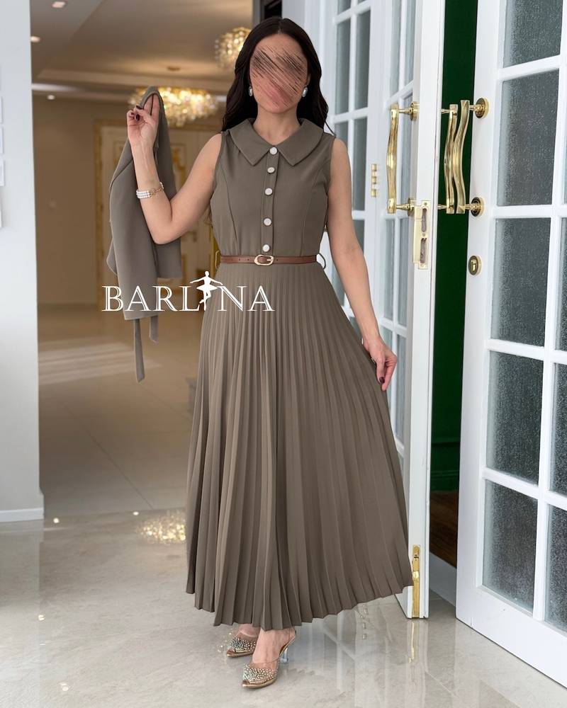 Beige pleated dress with a short flowing cape