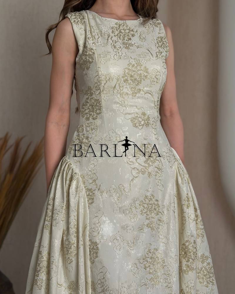 Off white lace dress with an elegant design