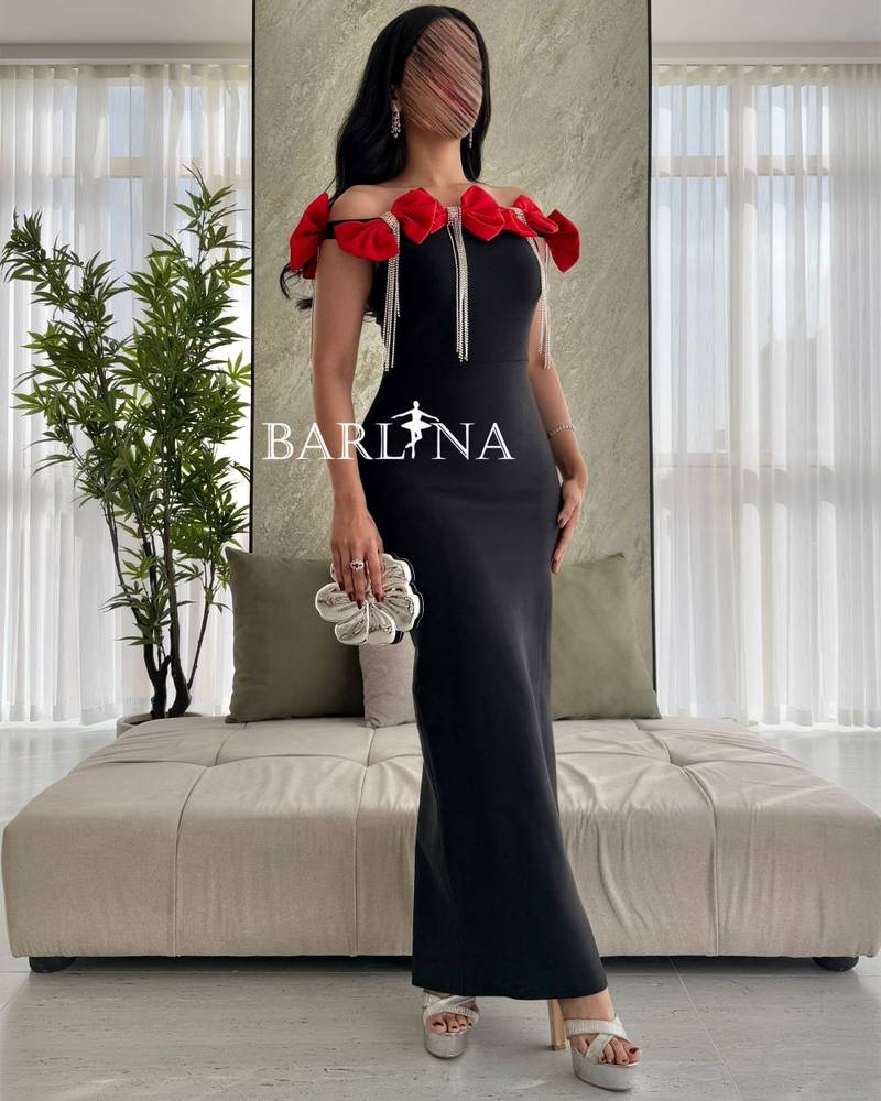A classic black dress with bows