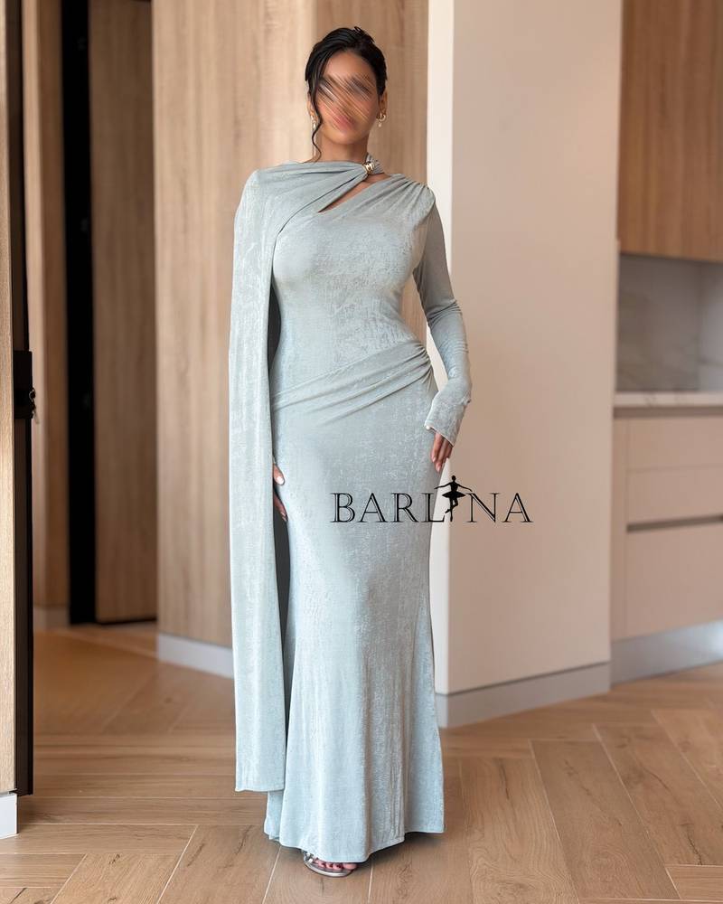Elegant dress with a slanted shoulder and a long side cape