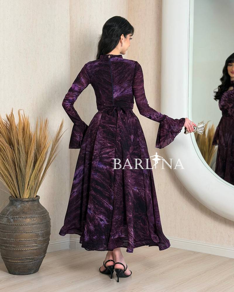 Purple dress with long sleeves and a plunging neckline