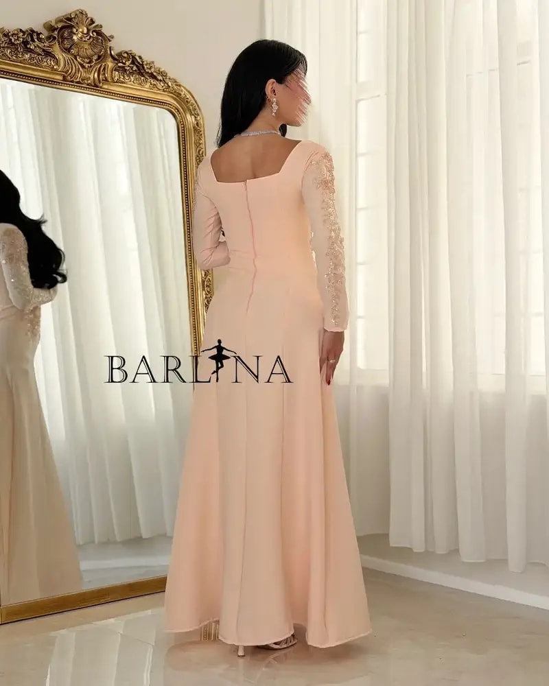 Embroidered melon occasion dress with shimmer details