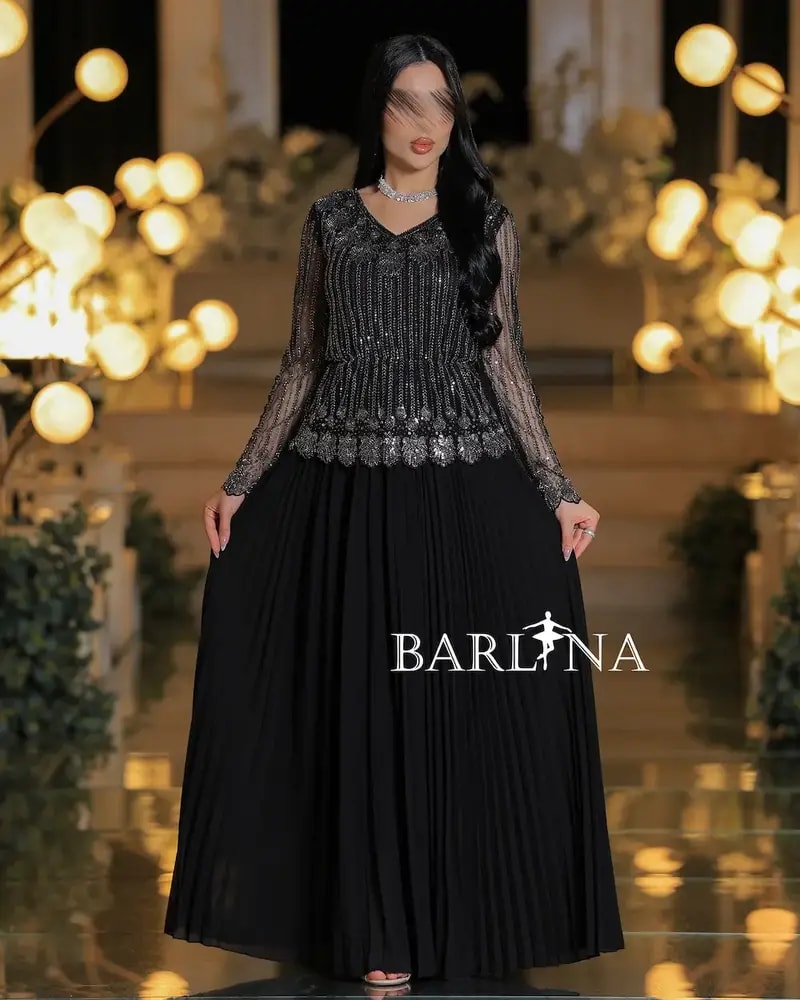 Luxurious dress with elegant sheer sleeves
