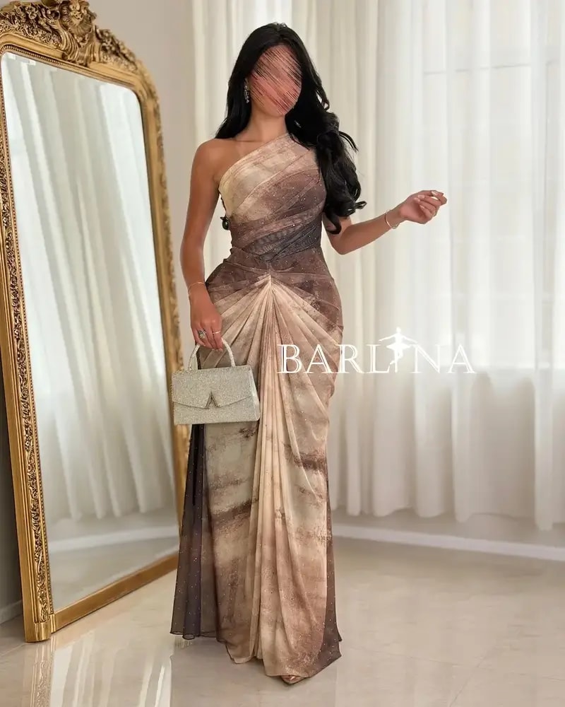 One-shoulder draped dress in gradient colors