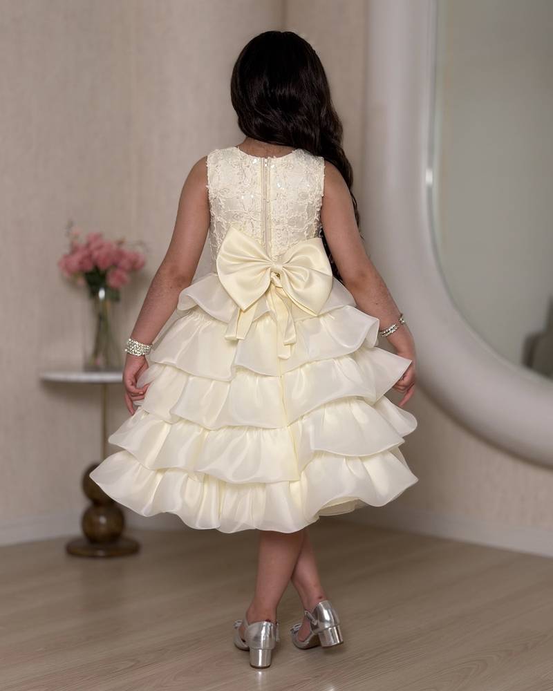 Ivory girls' dress with multiple ruffle layers