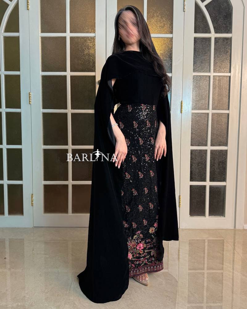 Luxurious black jalabiya with a velvet scarf