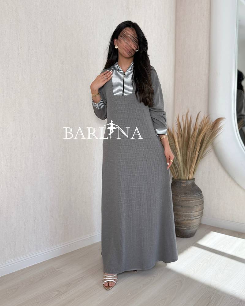 Long gray winter shirt decorated with a striped pattern