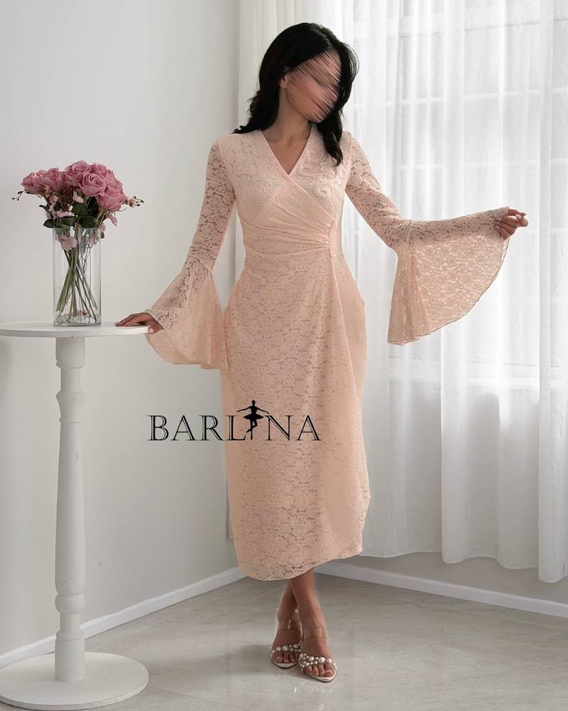 Pink lace midi dress with a feminine cut
