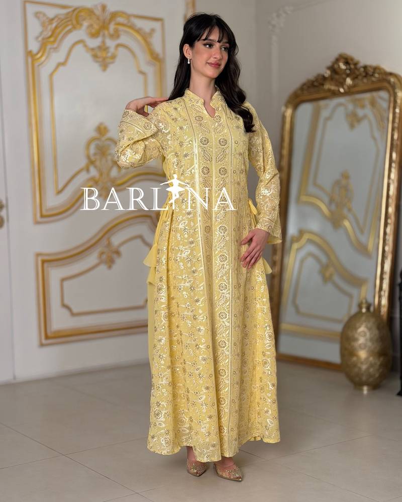 jalabeya with white embroidery and a side tie