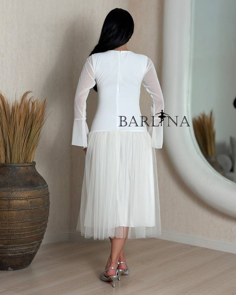 Soft off-white tulle dress with a low waist