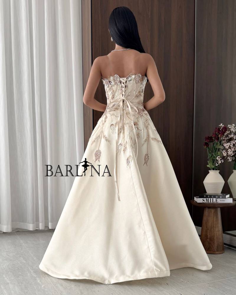 Beige evening dress with gold embroidery