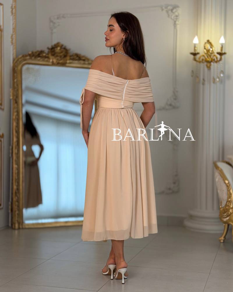 Beige midi dress with lightweight fabric and an elegant cut