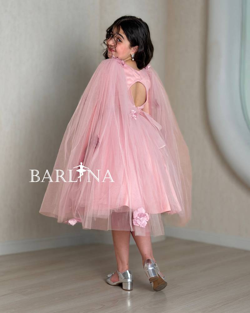 Pink girl's dress with rose details and tulle layers