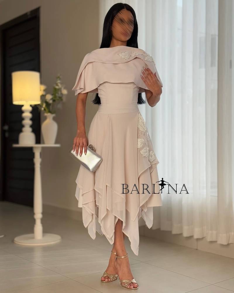 Light beige dress with an asymmetrical hem