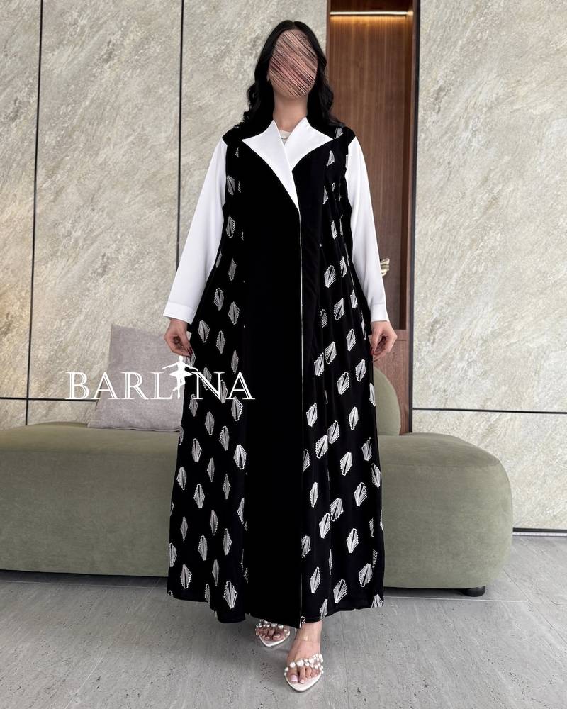 Elegant black abaya with white details