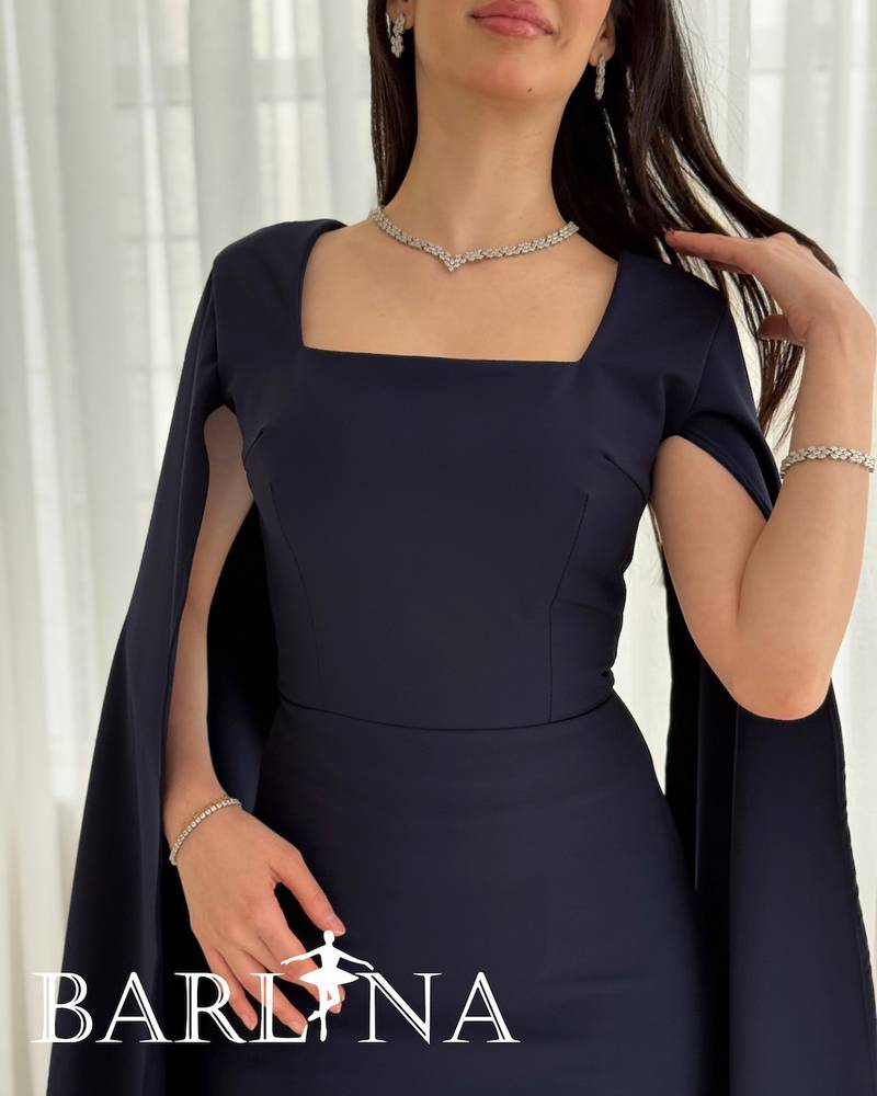 Long navy dress with flowing cape sleeves