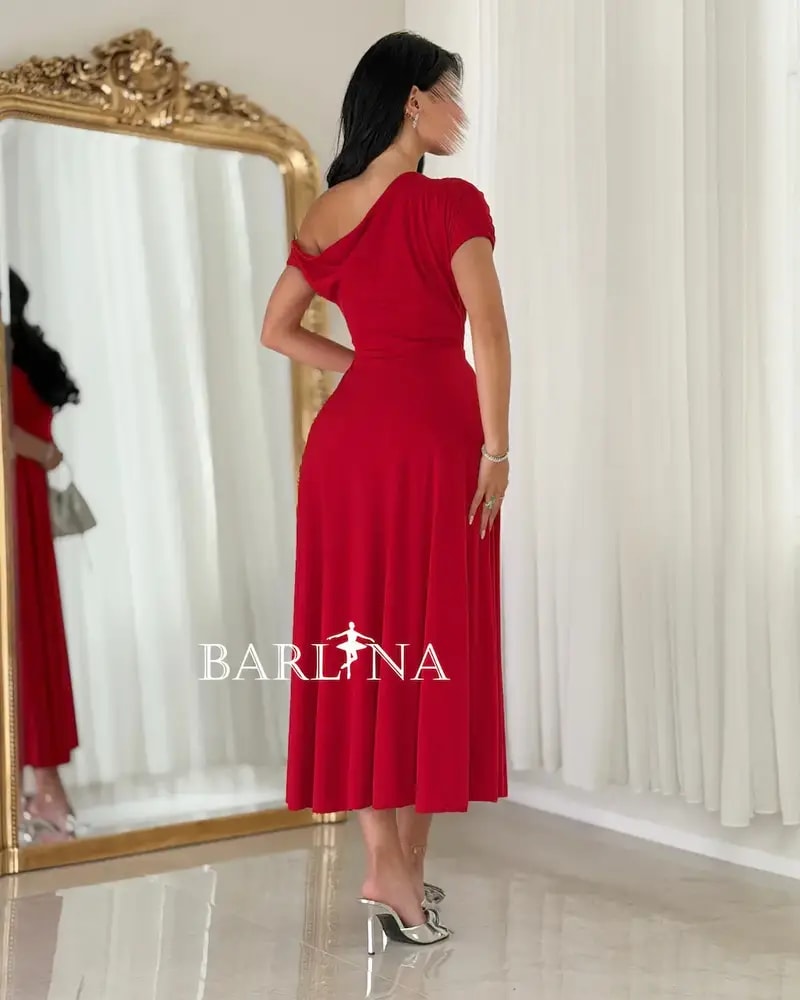 A soft and elegant red midi dress