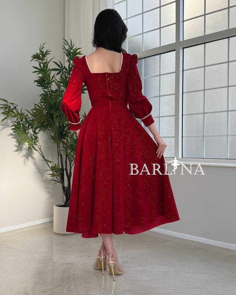 Red midi dress with shimmering details