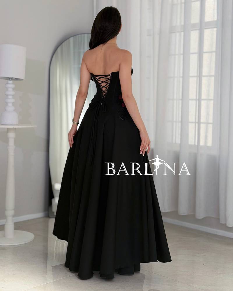 Long black evening dress with an elegant corset cut