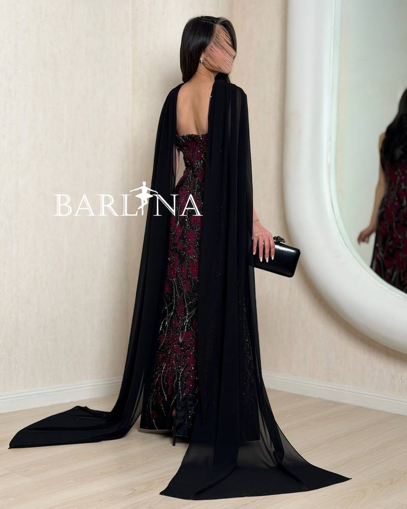 Black evening dress with burgundy embroidery