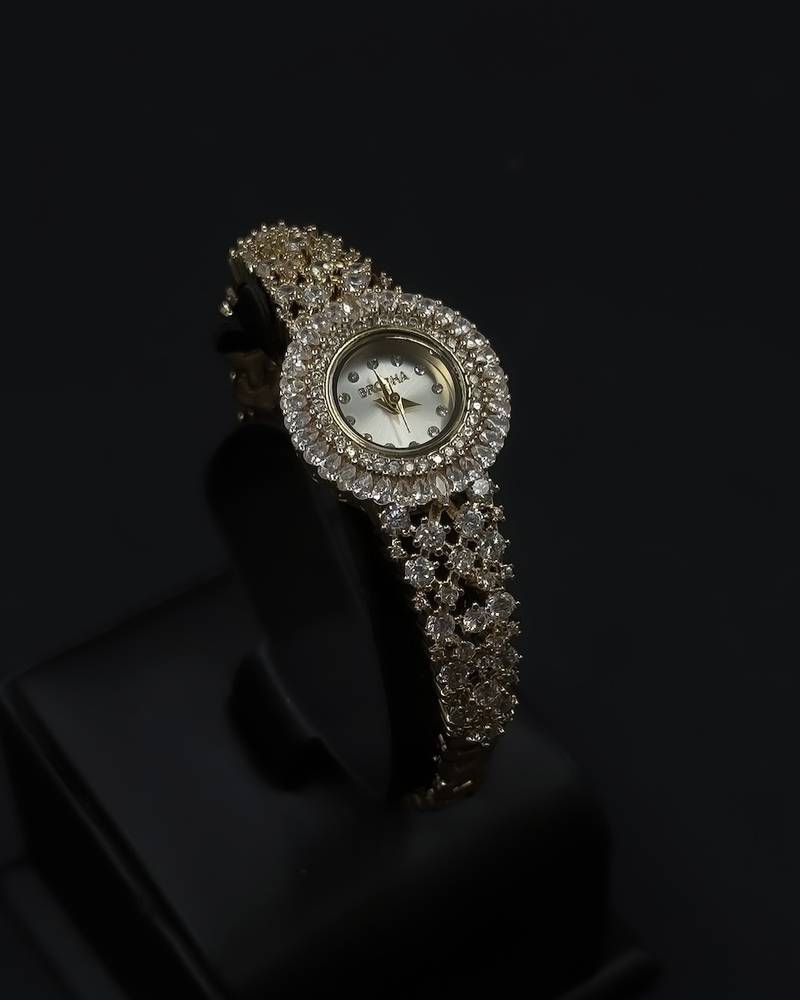 Women's watch with a round design and crystal embellishments