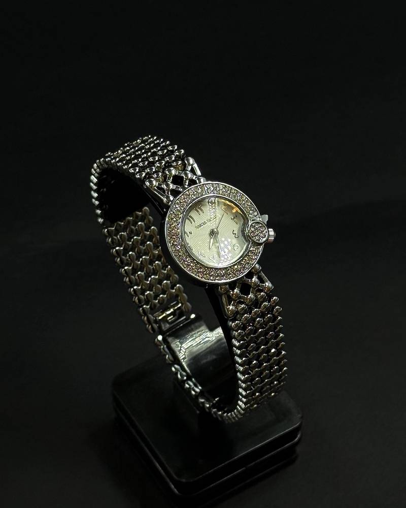 Women's watch with an elegant metal bracelet