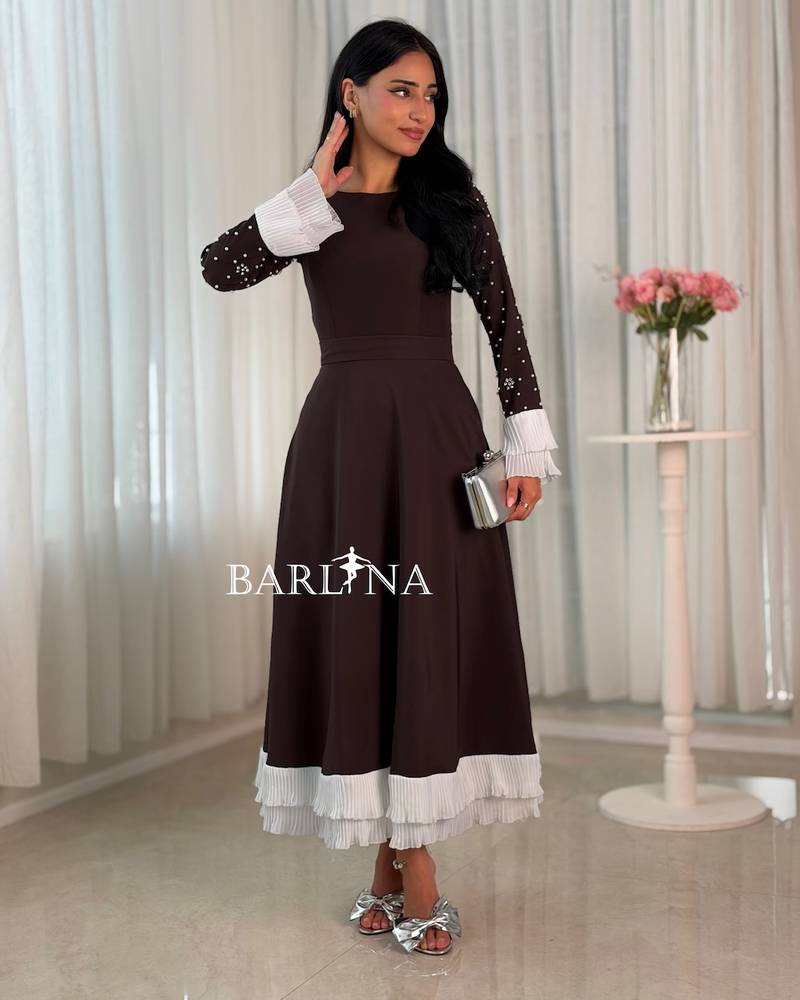 Brown midi dress with pearl-embellished sleeves