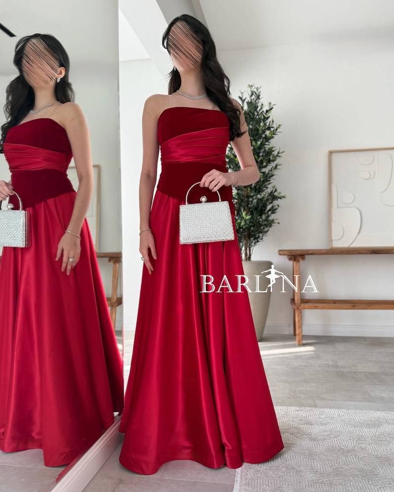 Sleeveless red dress adorned with velvet fabric
