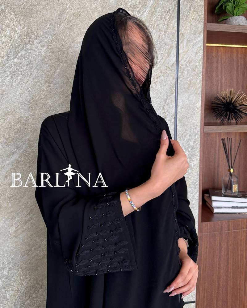 Black abaya embroidered with a royal touch