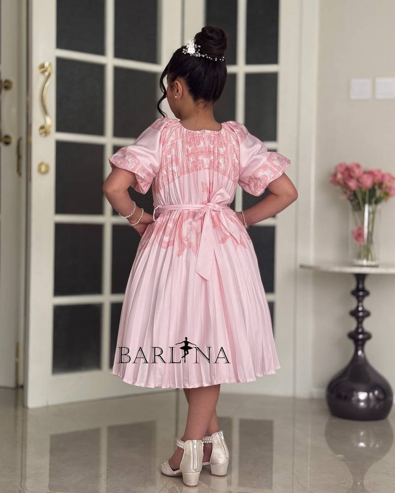 Soft pleated dress for girls with a wide cut