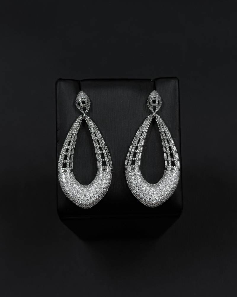 Large oval hollow design earrings