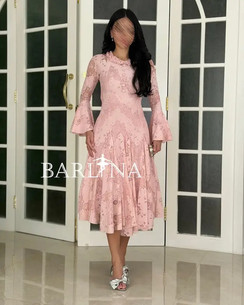 A soft dress adorned with elegant lace patterns