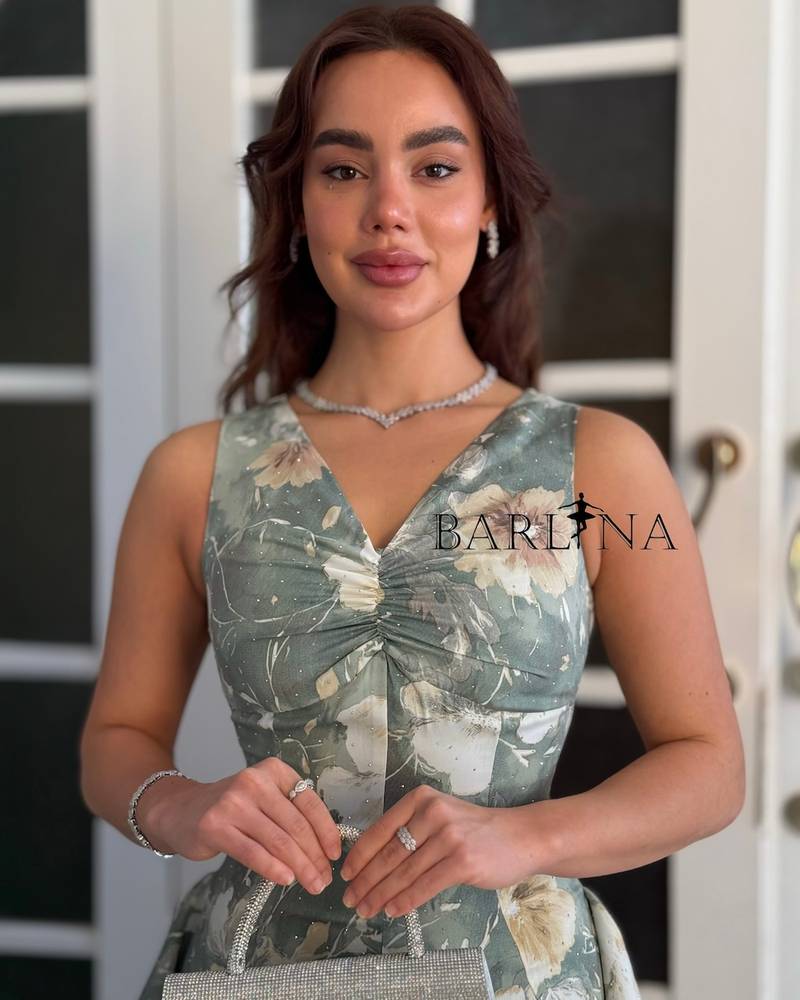 Elegant ruffled gray floral dress