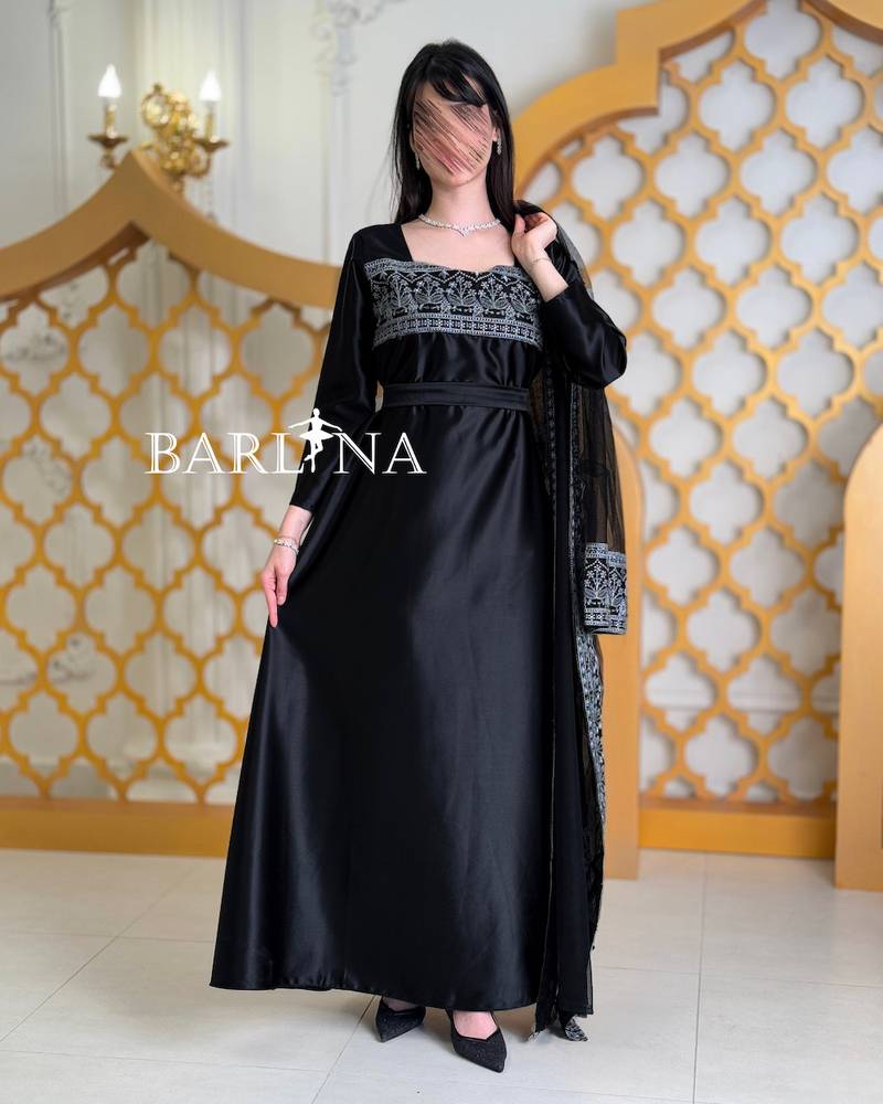 Black jalabiya with silver embroidery and a classic design
