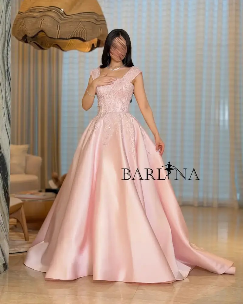 Evening dress with a full skirt and elegant embroidery