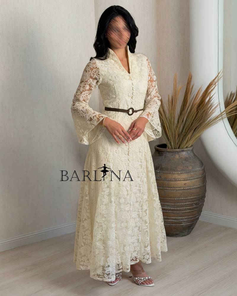 Elegant beige dress with delicate lace and belt