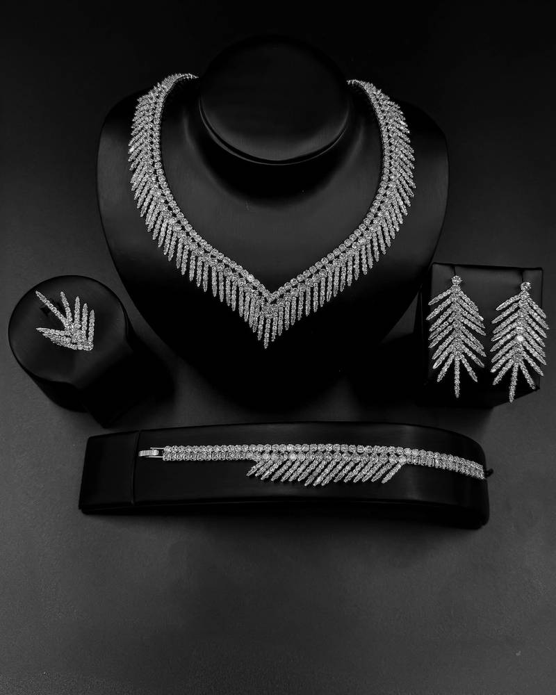 Delicate leaf design accessory set studded with stones