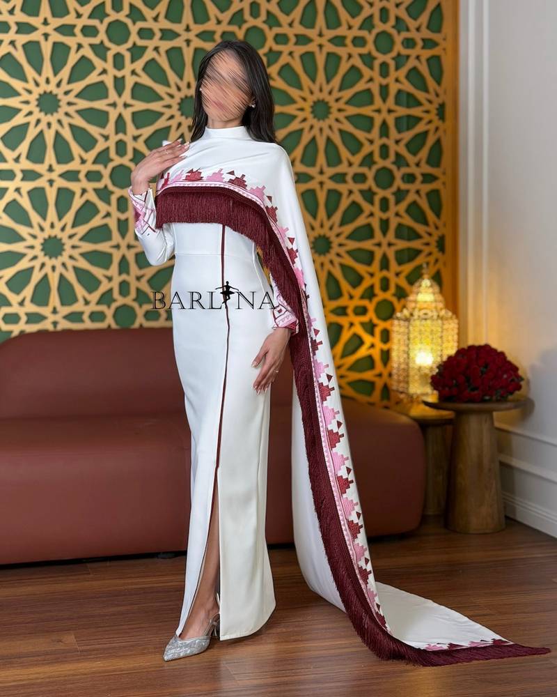 Modern white jalabiya with traditional embroidery