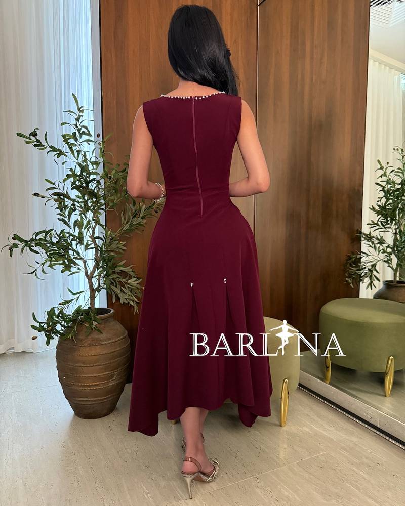 Oudi midi dress with a soft cloche cut