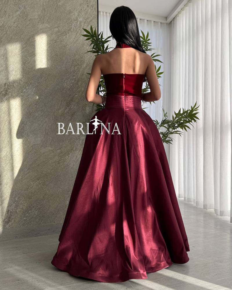 Luxury burgundy dress with a distinctive neckline